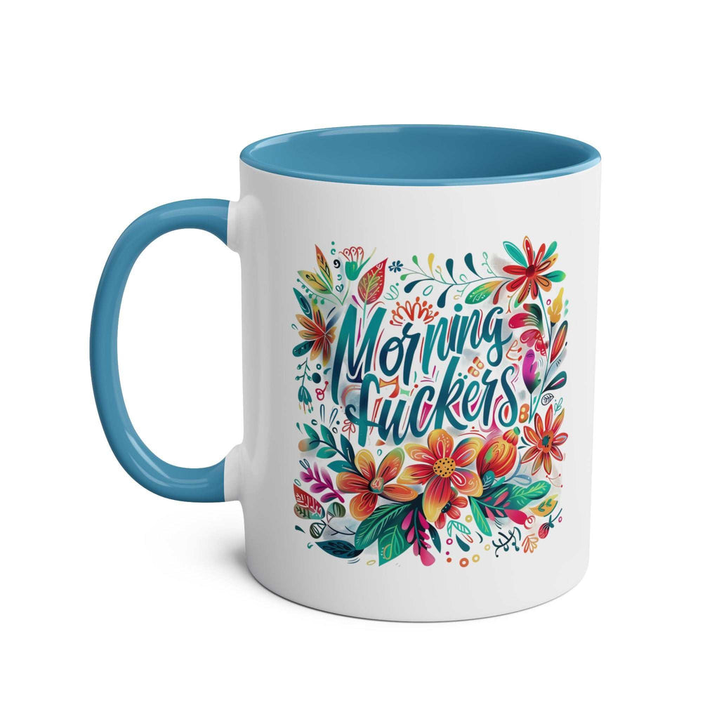 Cheeky "Morning Fuckers" coffee mug with colorful floral design and blue handle.