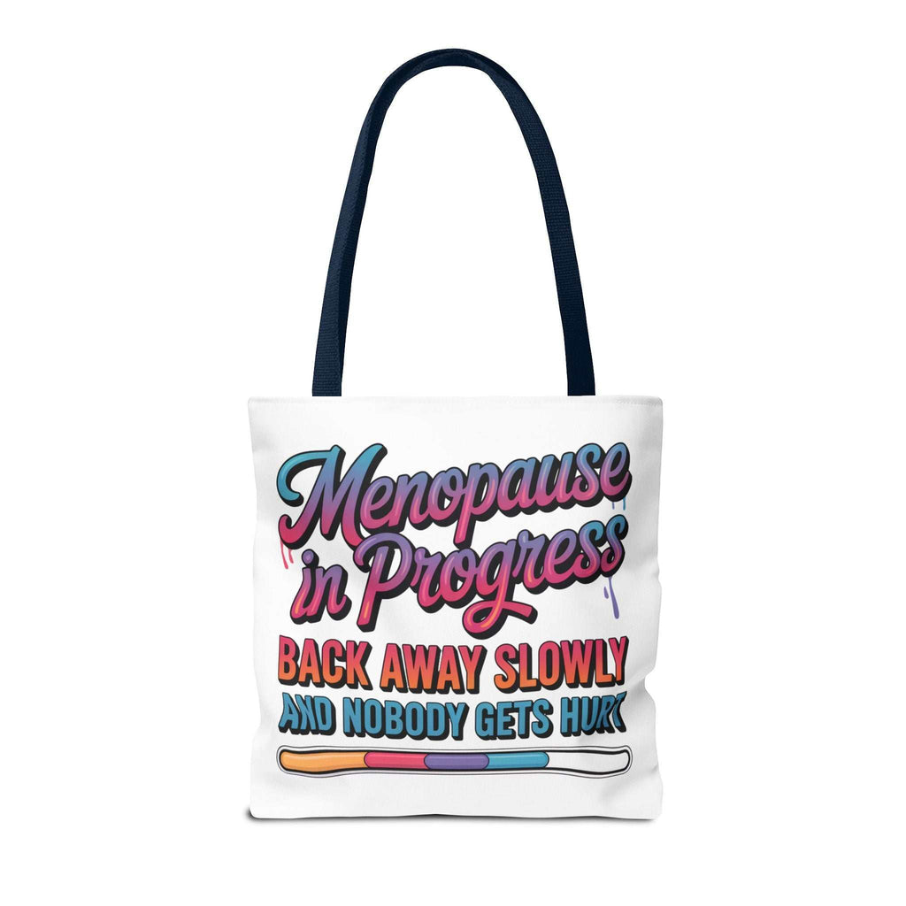 Menopause in Progress tote bag with cheeky design, durable spun polyester, multiple sizes and handle colors, perfect for errands and gifts