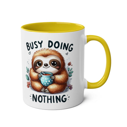Cute sloth coffee mug with a cheerful design, featuring vibrant colors and a whimsical sloth illustration, 11oz ceramic, microwave and dishwasher safe.