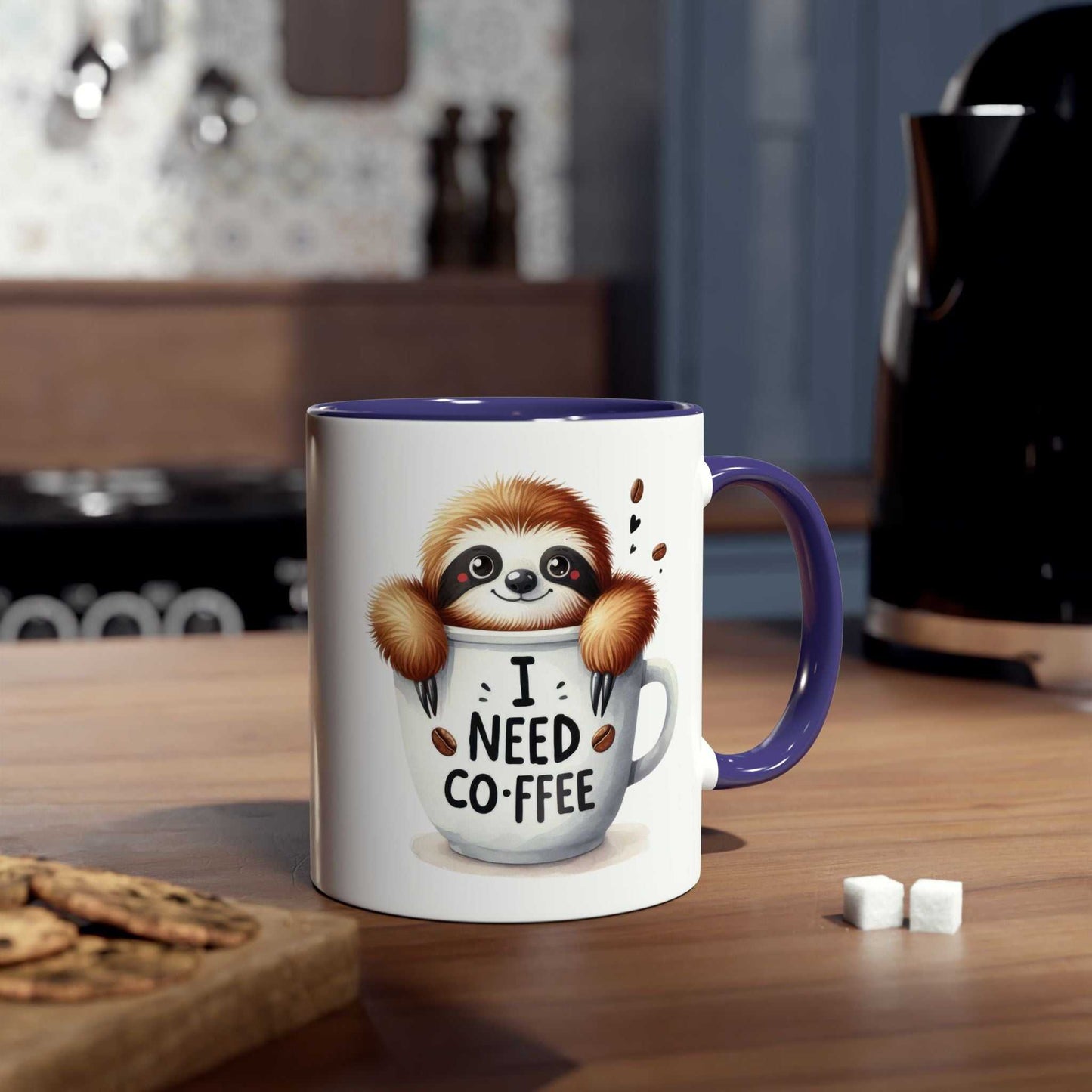 Cute sloth coffee mug on kitchen counter, showing sloth and coffee design with blue handle.