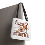 Fun stretching cat tote bag with cheeky design and colorful handles for casual use