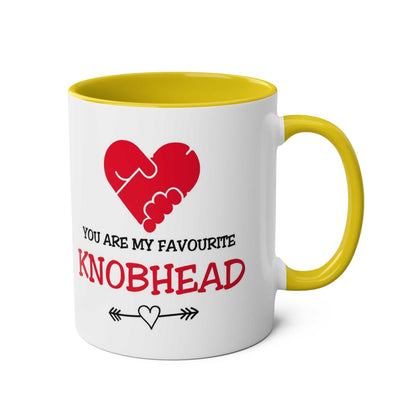 Funny "My Favourite Knobhead" mug with heart graphic, white ceramic, yellow rim and handle, perfect for Valentine's Day gift.
