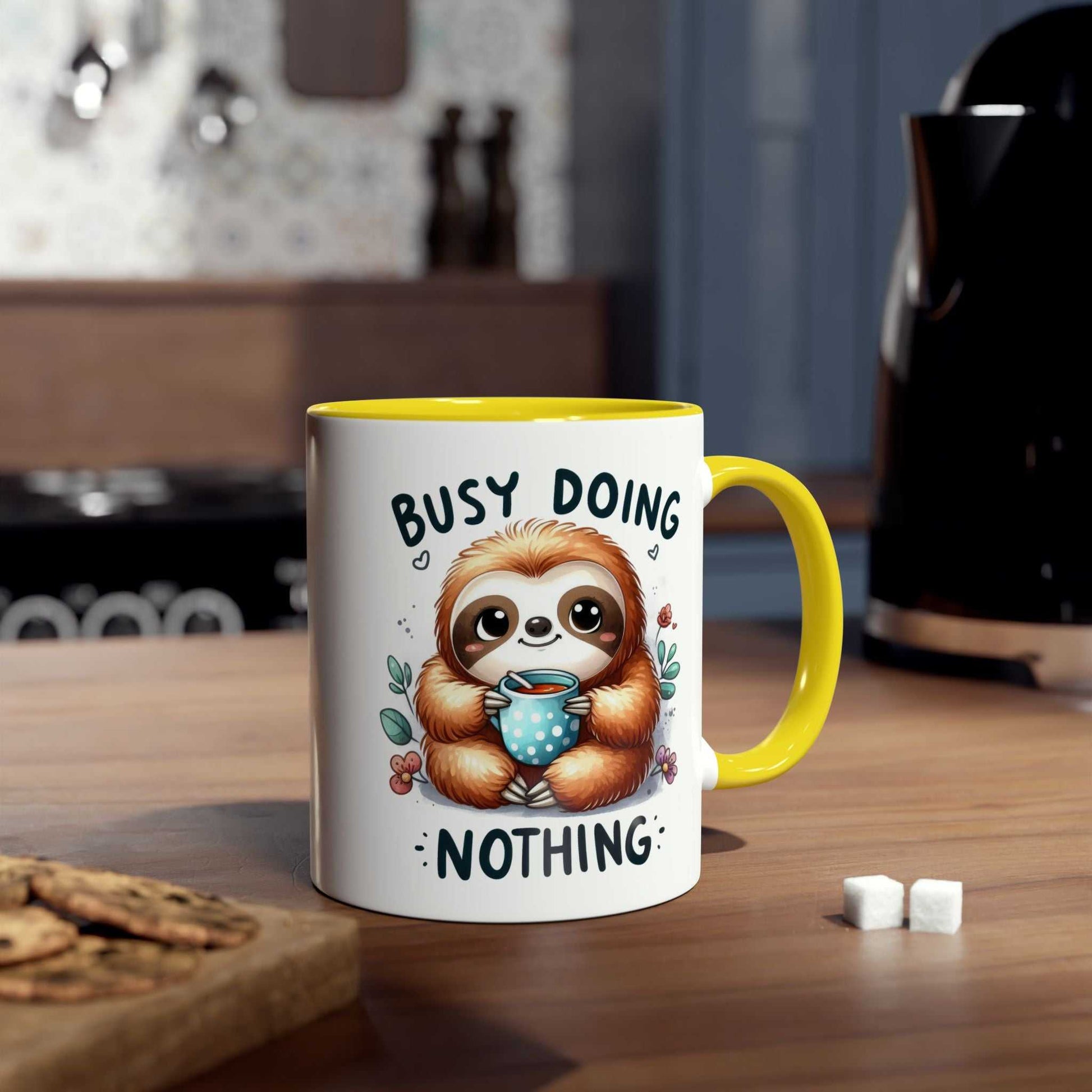 Cute sloth coffee mug with a whimsical design on a kitchen counter.