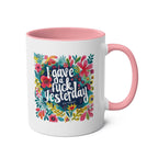 Colorful "I Gave a Fuck Yesterday" coffee mug with floral design, pink handle, and interior.