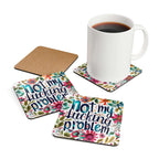 "Not My Fucking Problem" coaster set with floral design, high-gloss MDF top, and cork back, shown with a mug.