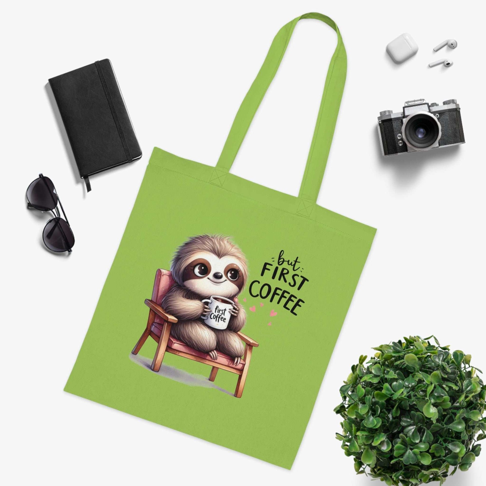 Cute sloth design cotton tote bag with reinforced handles and vibrant colors.