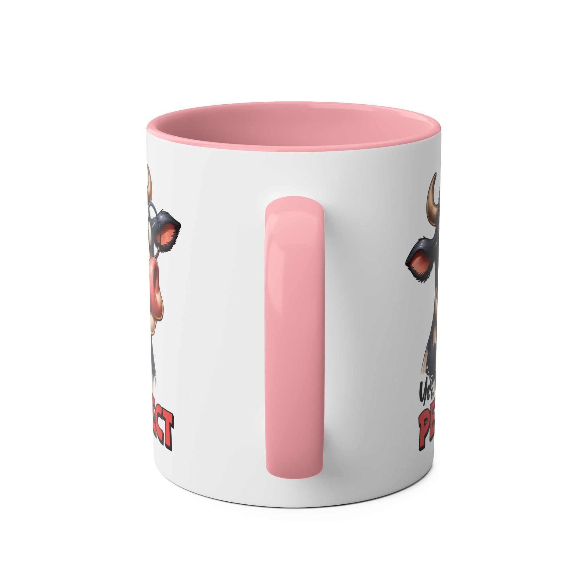 Pink and white cow design coffee mug with "I Am Perfect" text.