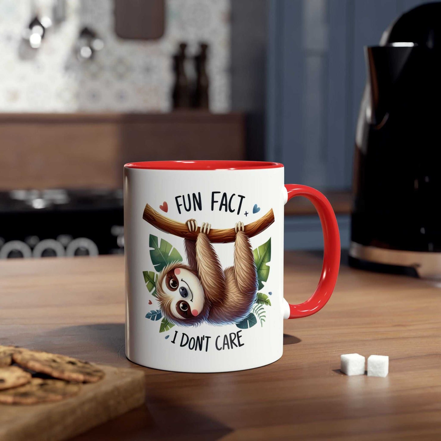 Cute sloth coffee mug with 'Fun Fact, I Don't Care' design, red handle, and interior, perfect for sloth lovers.