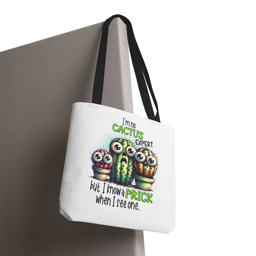 Fun cactus tote bag with cheeky design, durable spun polyester, multiple sizes and handle colors