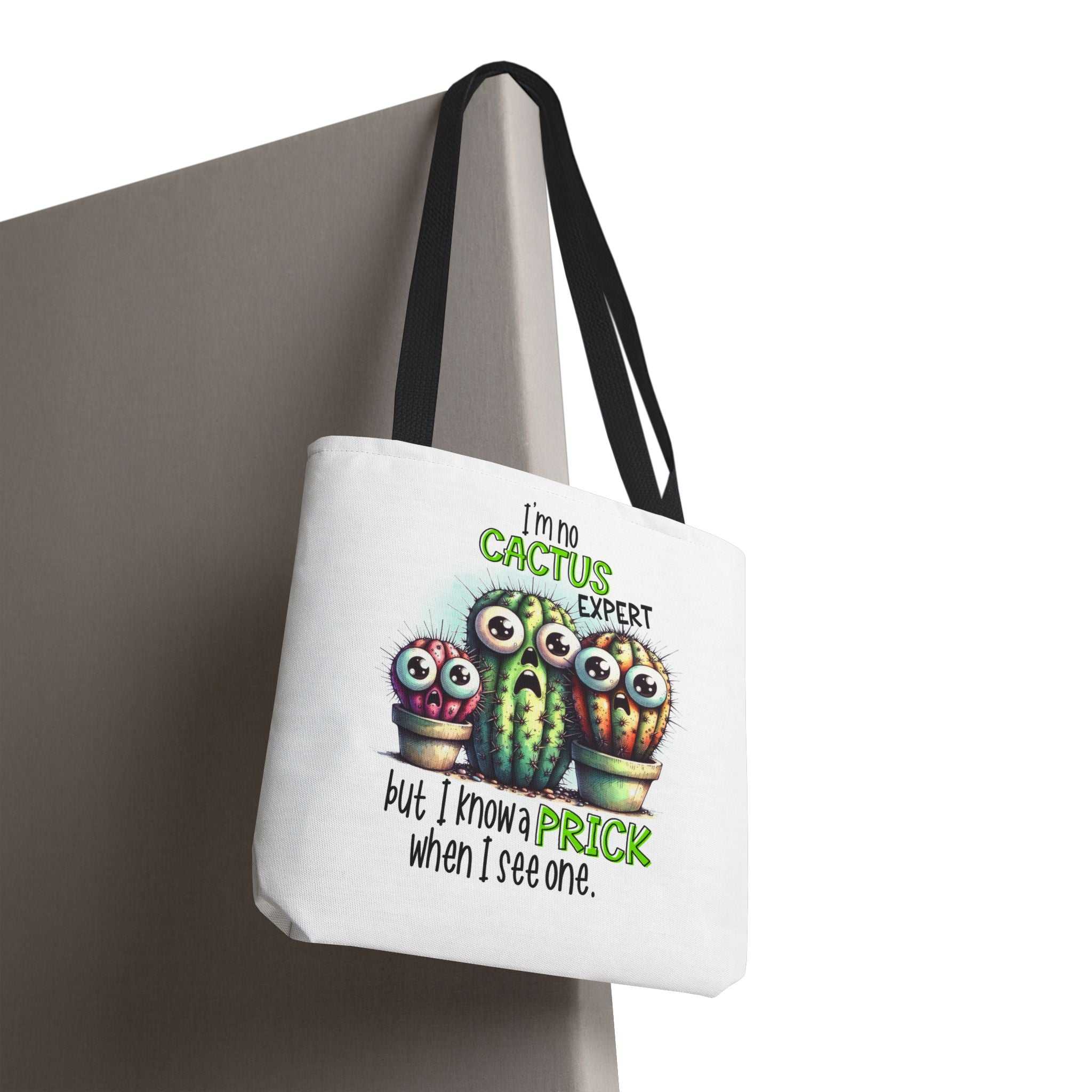 Fun cactus tote bag with cheeky design, durable spun polyester, multiple sizes and handle colors