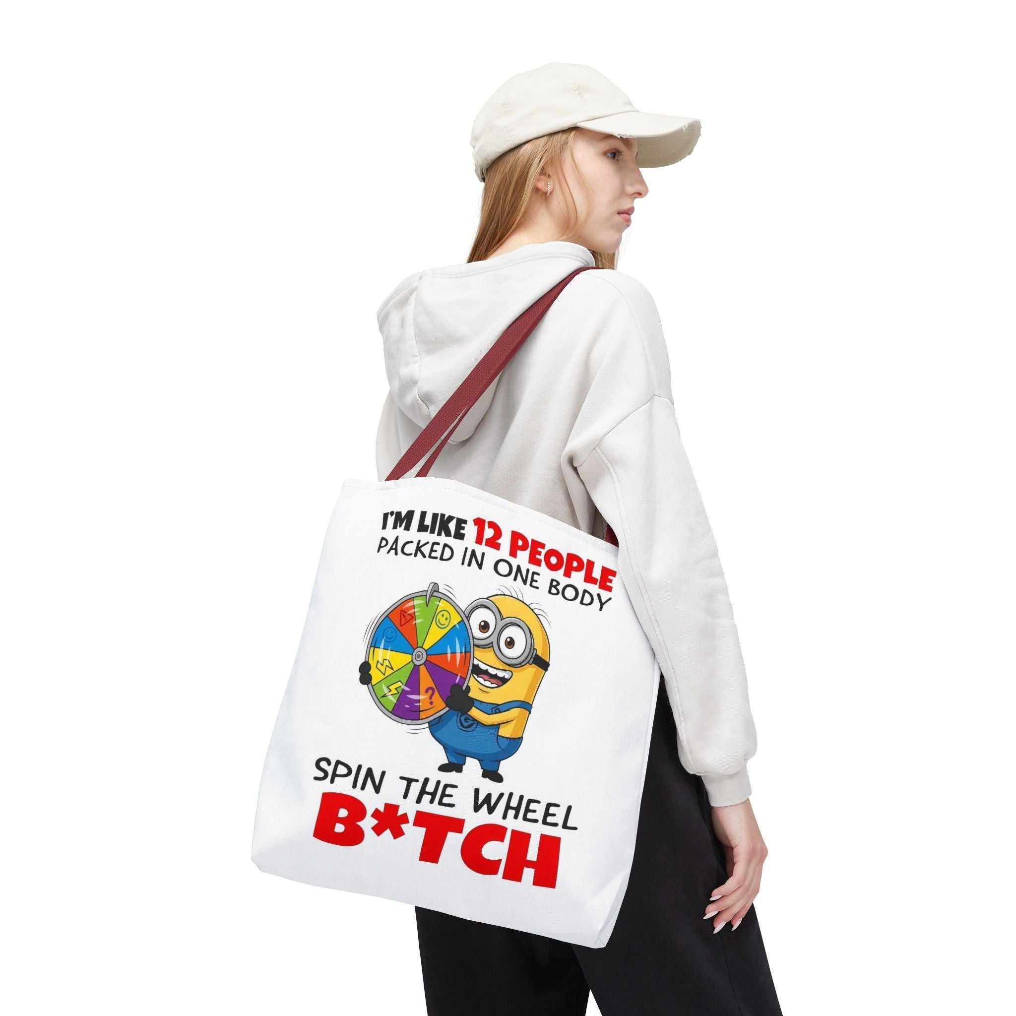 Funny Minion tote bag with cheeky design, durable spun polyester, and multiple handle colors for everyday use