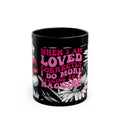Black ceramic mug with cheeky quote and glossy finish for coffee or tea