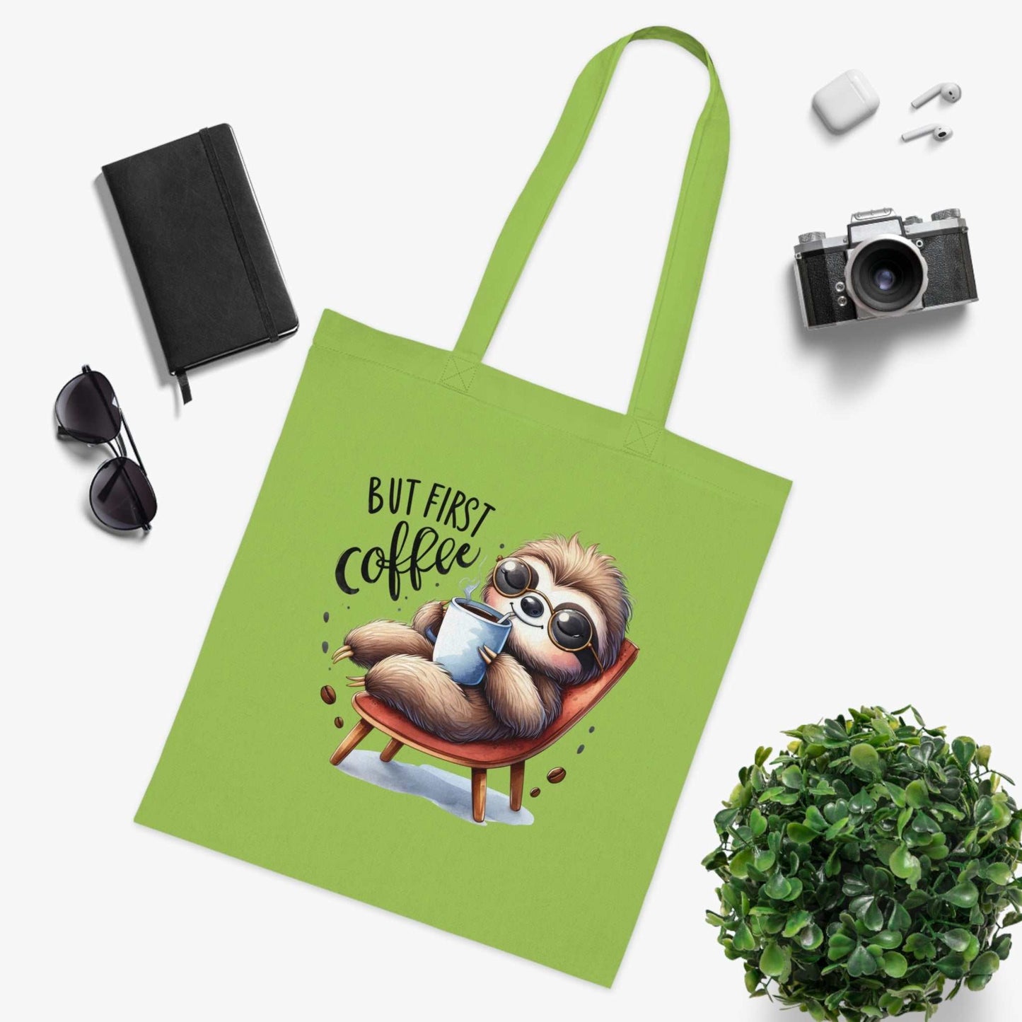 Cute sloth tote bag with "But First Coffee" print, made from 100% cotton, durable and lightweight; ideal for sloth enthusiasts.