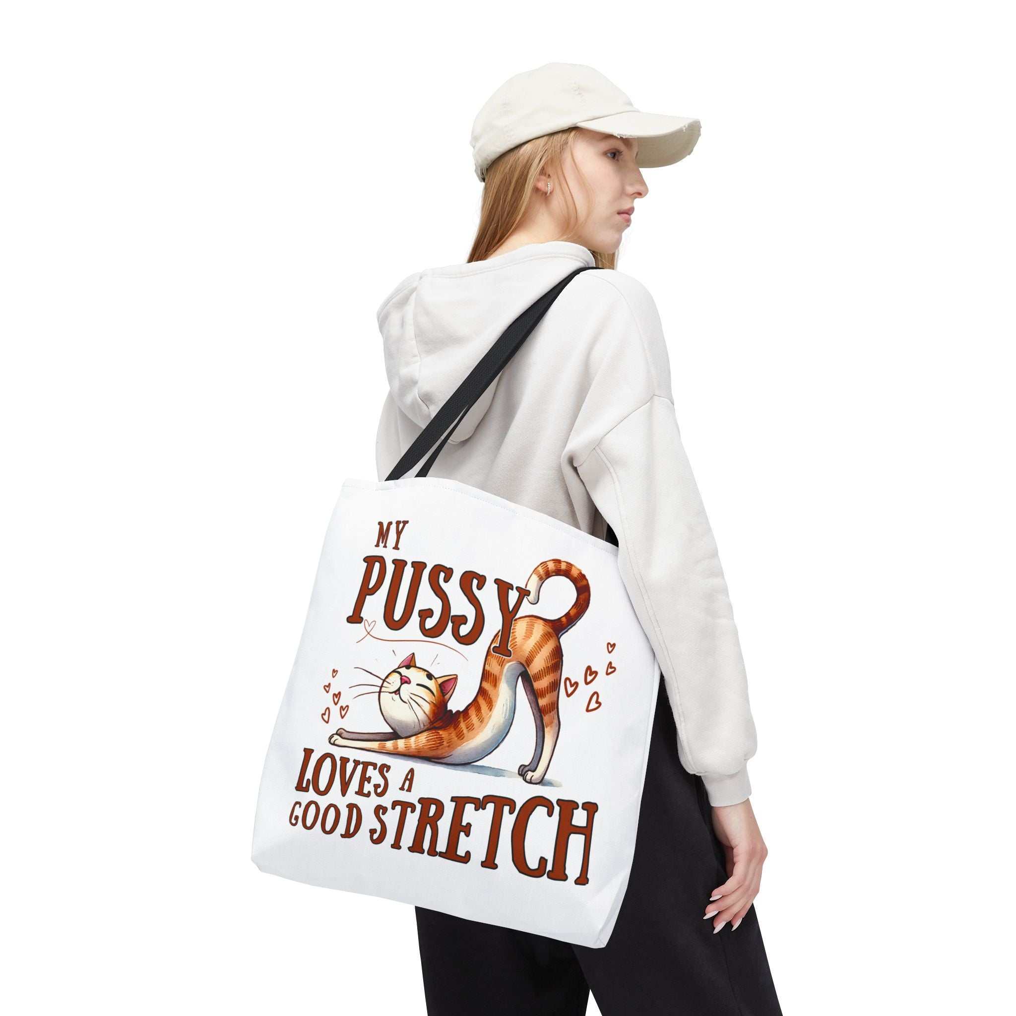 Fun stretching cat tote bag with playful design, durable spun polyester, multiple sizes and handle colors