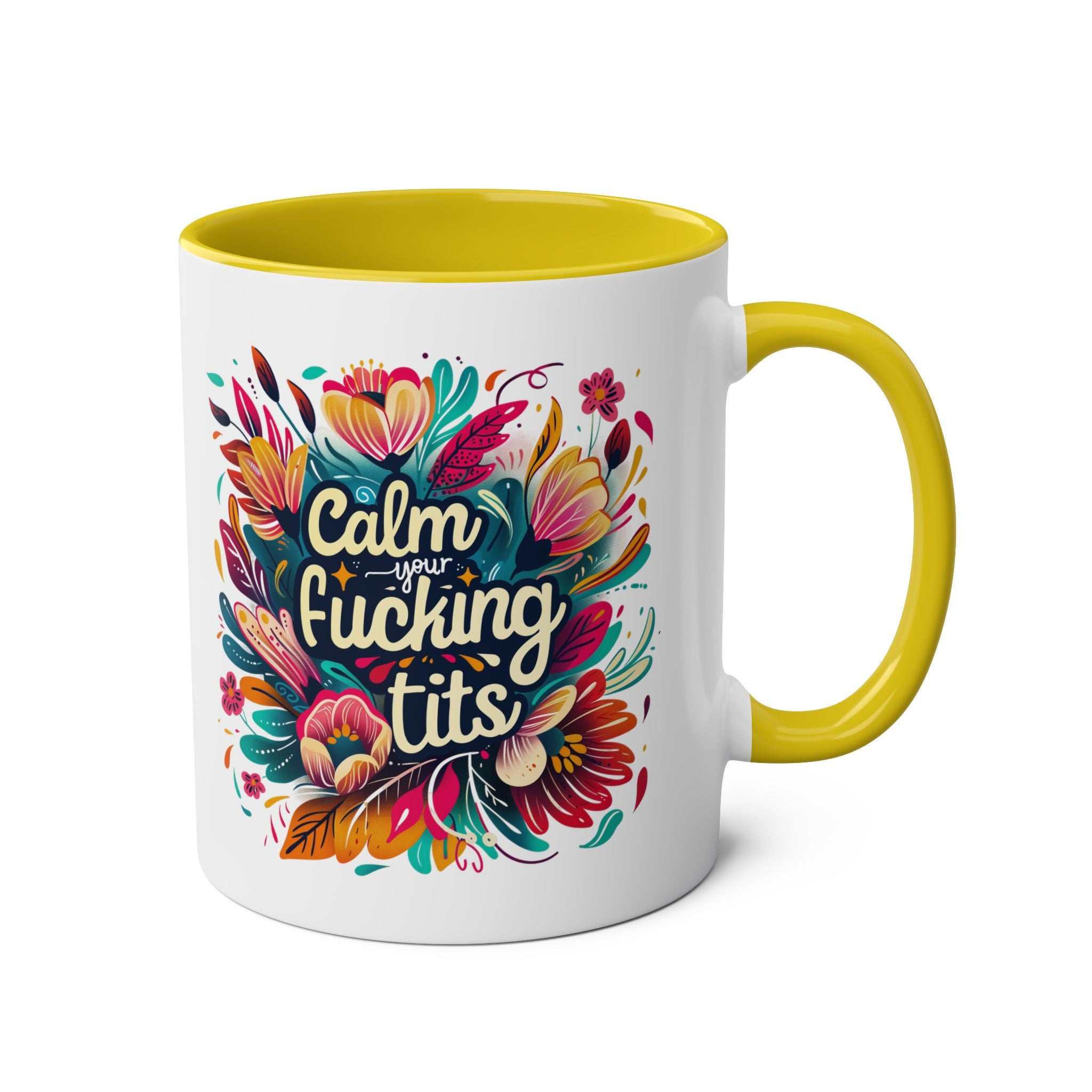 Colorful "Calm Your Tits" coffee mug with vibrant floral design, yellow handle, and interior.