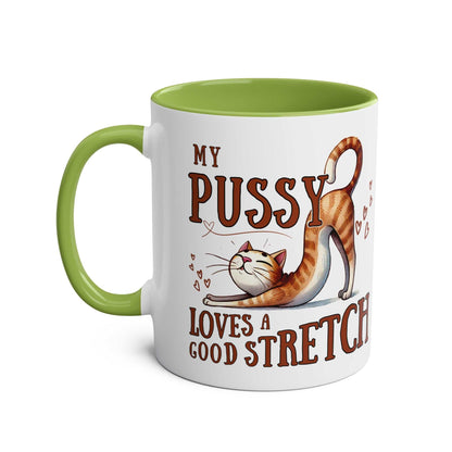 Playful Cheeky Fun Coffee Mug with cat print and green handle.