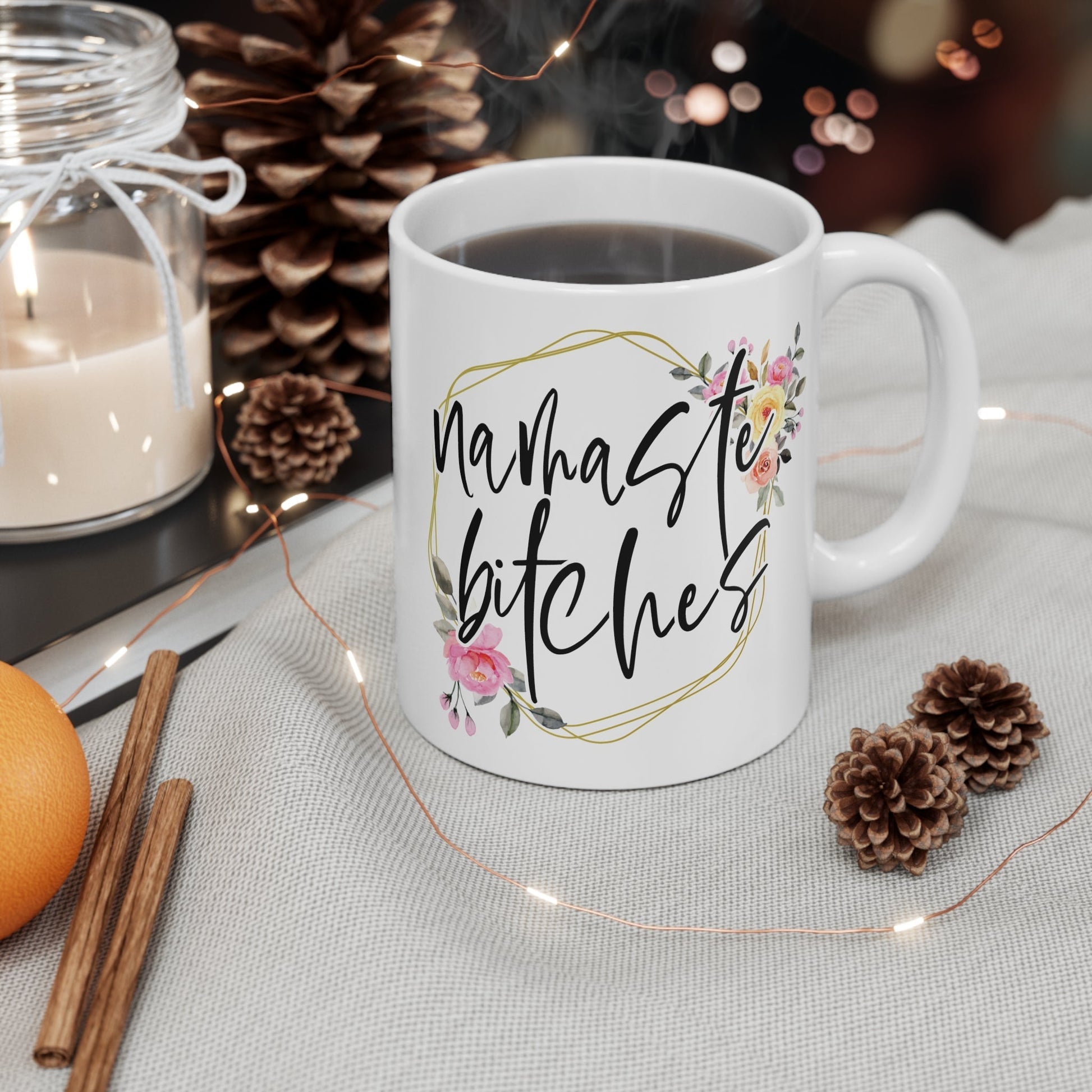 Namaste Bitches Ceramic Mug with floral design, 11oz glossy finish, microwave and dishwasher safe.