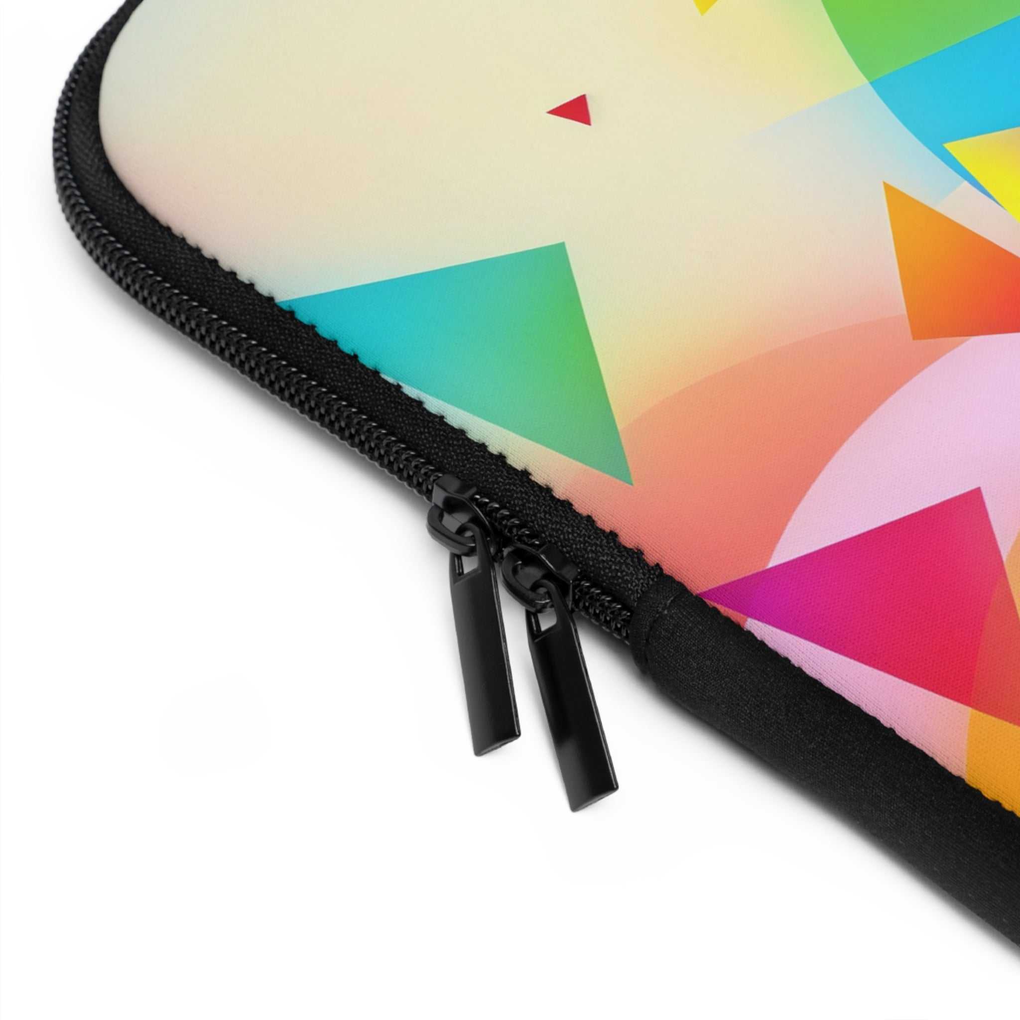 Close-up of geometric pride design laptop sleeve with dual black zipper and vibrant colorful neoprene material protection