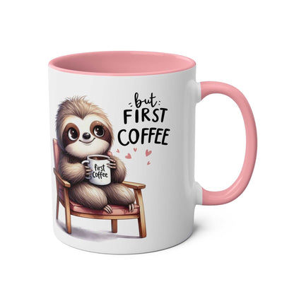 Cute sloth coffee mug with whimsical design and pink handle.