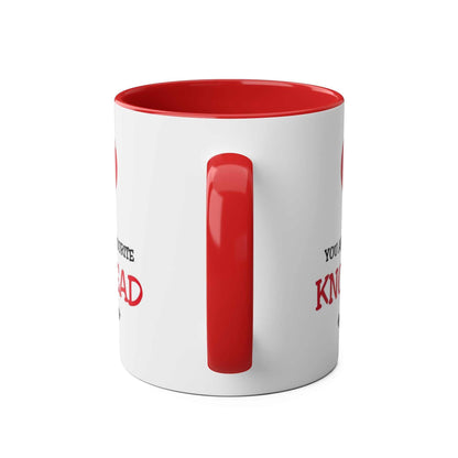 Ceramic mug with red handle and inside, featuring a fun "Knobhead" design.