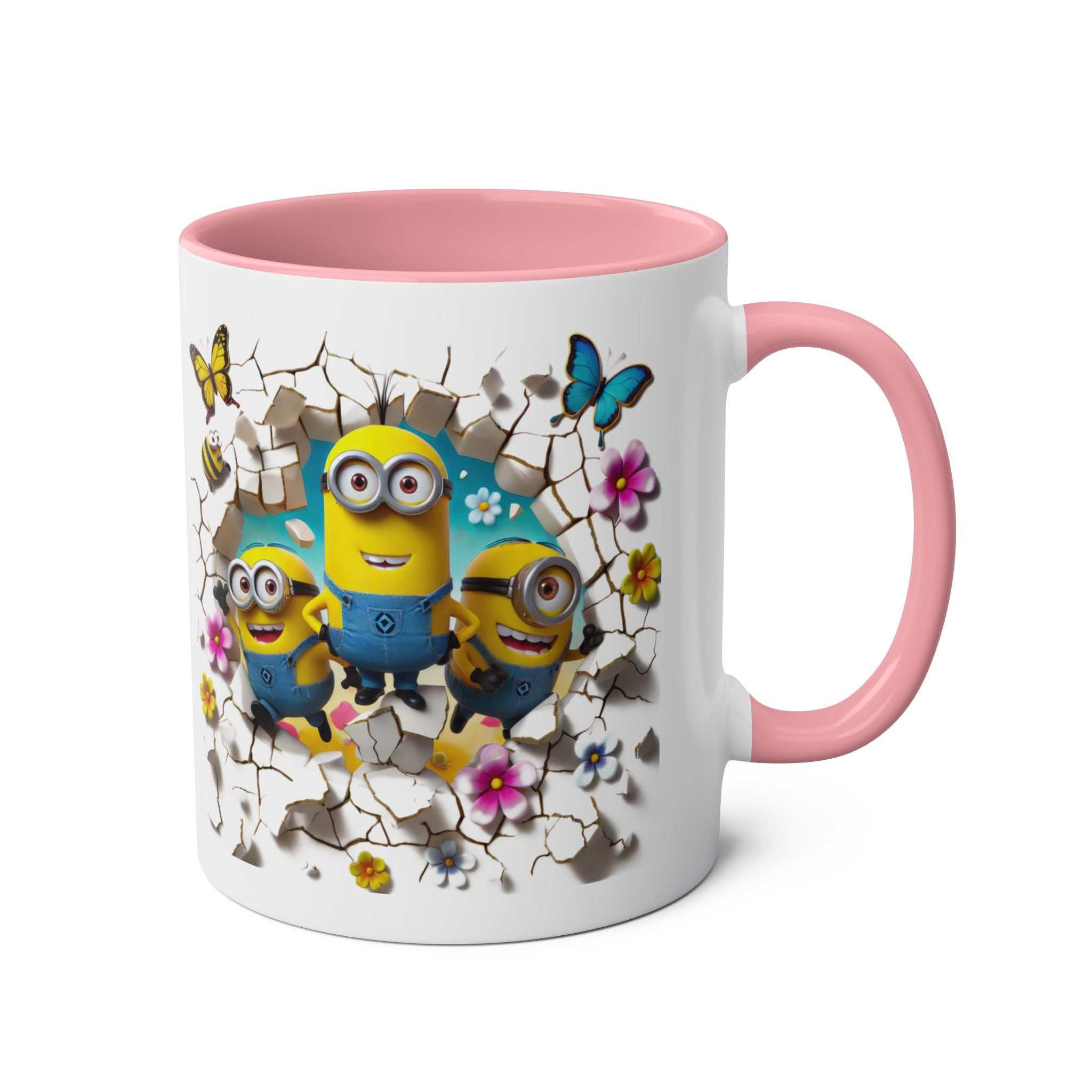 Fun Minion themed coffee mug with colorful characters and pink handle.