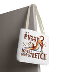 Fun stretching cat tote bag with cheeky design, durable polyester, multiple sizes and handle colors
