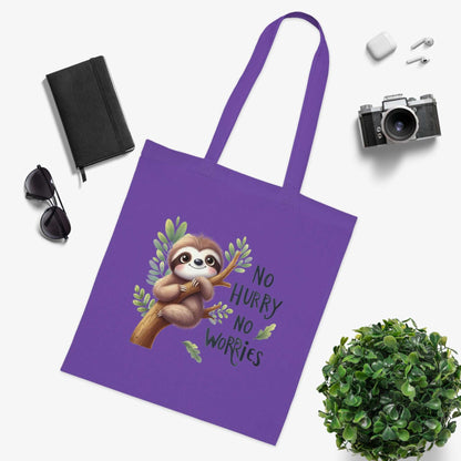 Cotton tote bag with cute sloth design and "No Hurry No Worries" text in vibrant colors.
