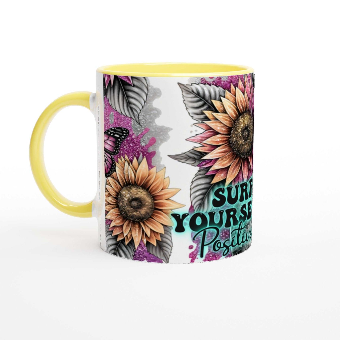 Positive Vibes motivational coffee mug with sunflower design and yellow handle.