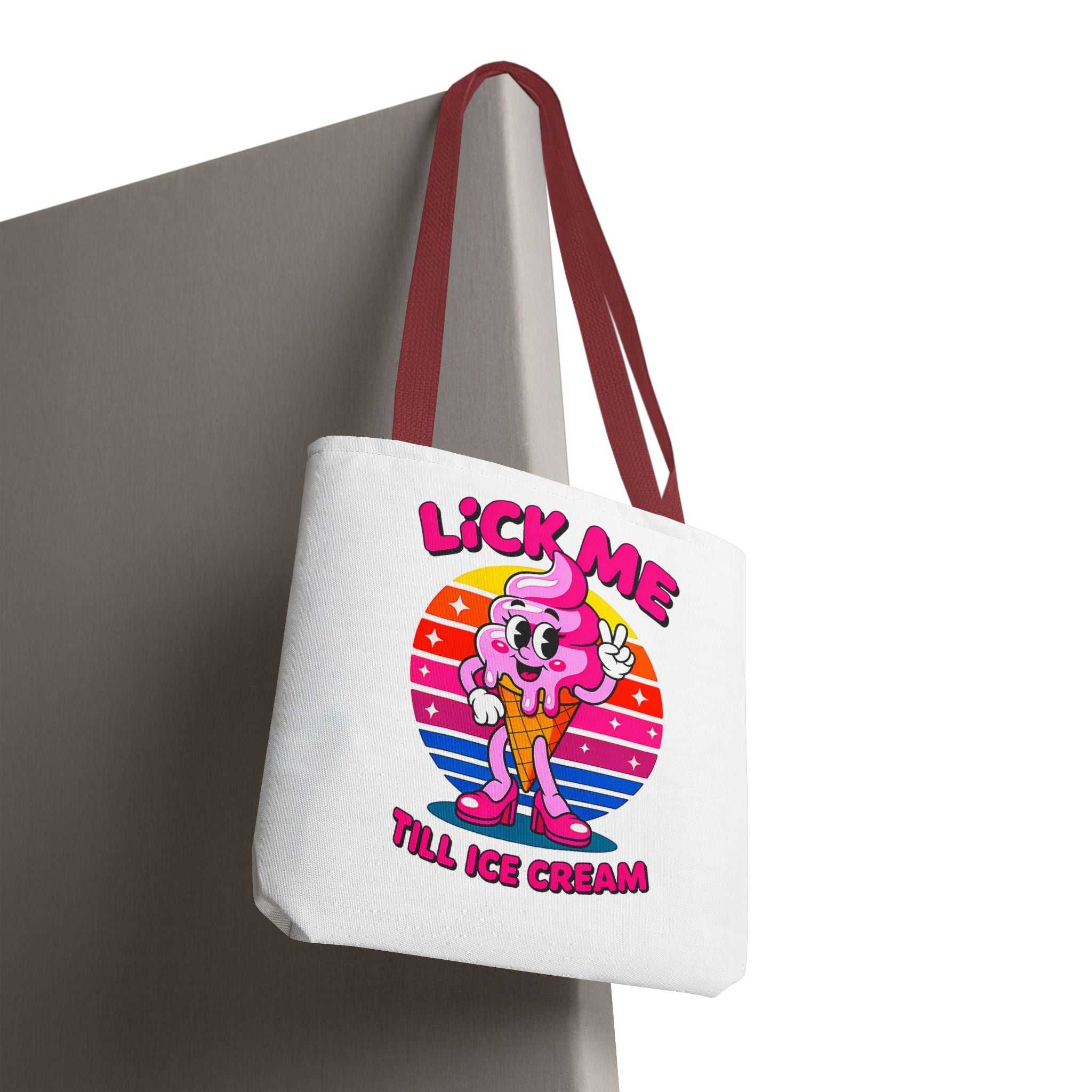 Cheeky Lick Me Till Ice Cream Tote Bag with colorful handles, durable spun polyester, and fun design for everyday use