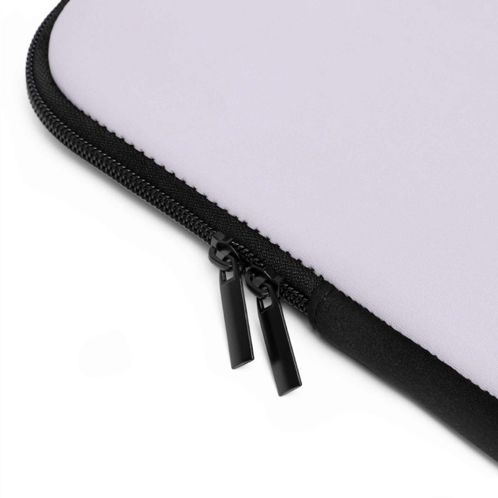 Close-up of lavender neoprene laptop sleeve with dual black zipper and soft foam lining for protection