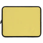 Lemon yellow neoprene laptop sleeve with black trim and dual zipper closure
