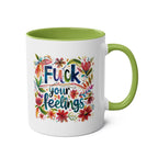 Rude humor ceramic mug with floral design and "Fuck Your Feelings" text.