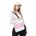 Pink heart tote bag with cheeky fun design and colorful handles for everyday use