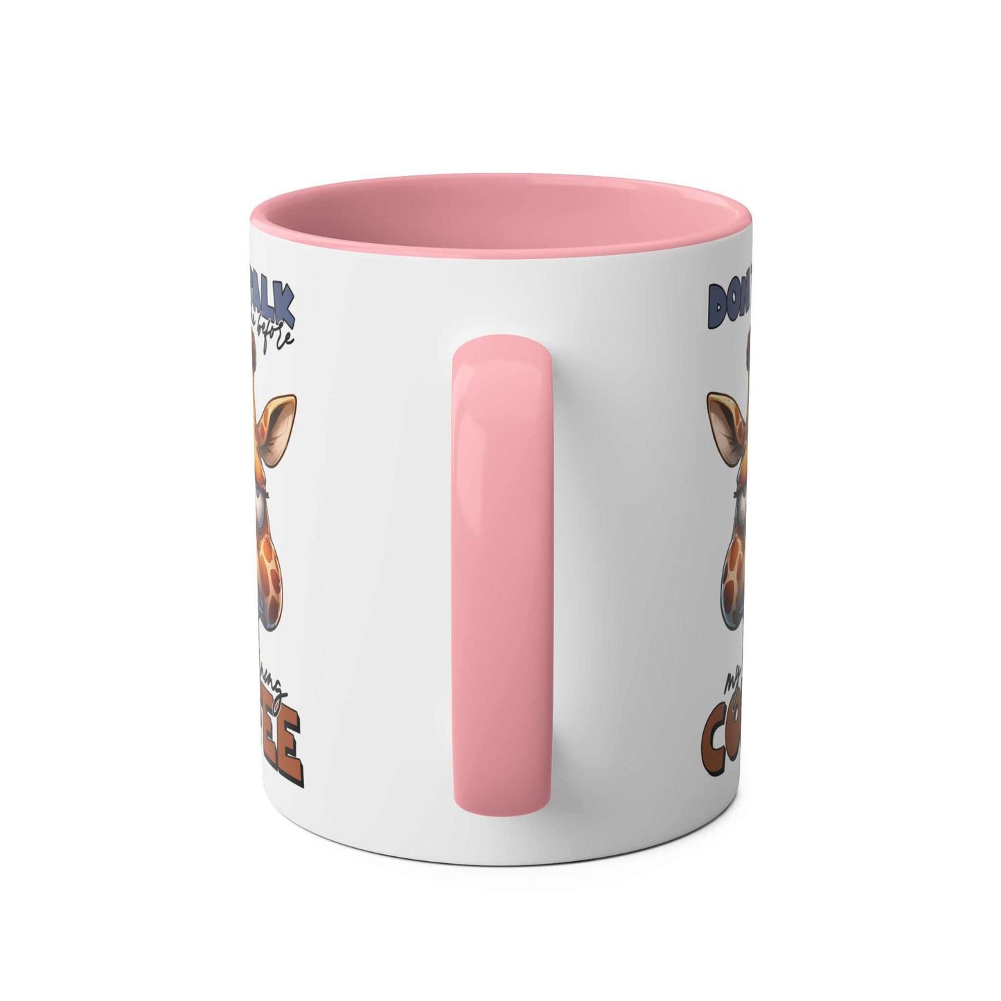 Pink-handled "Don't Talk To Me" coffee mug featuring a quirky giraffe design, 11oz ceramic, glossy finish.