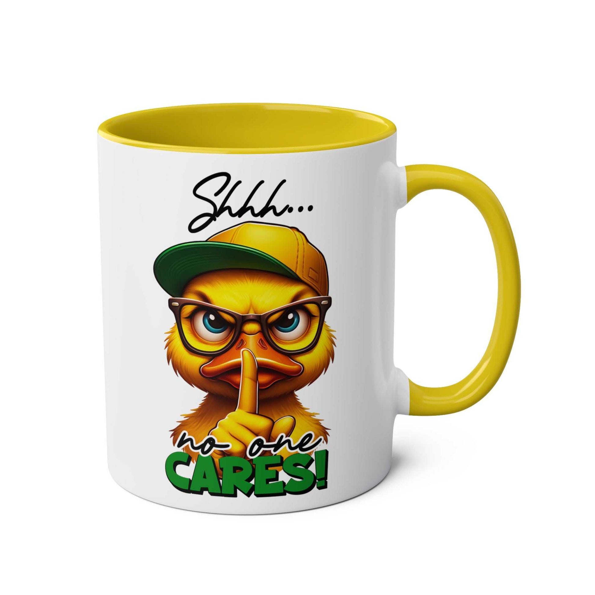 Sarky duck design on white and yellow 'No One Cares' coffee mug with playful "shhh" message.