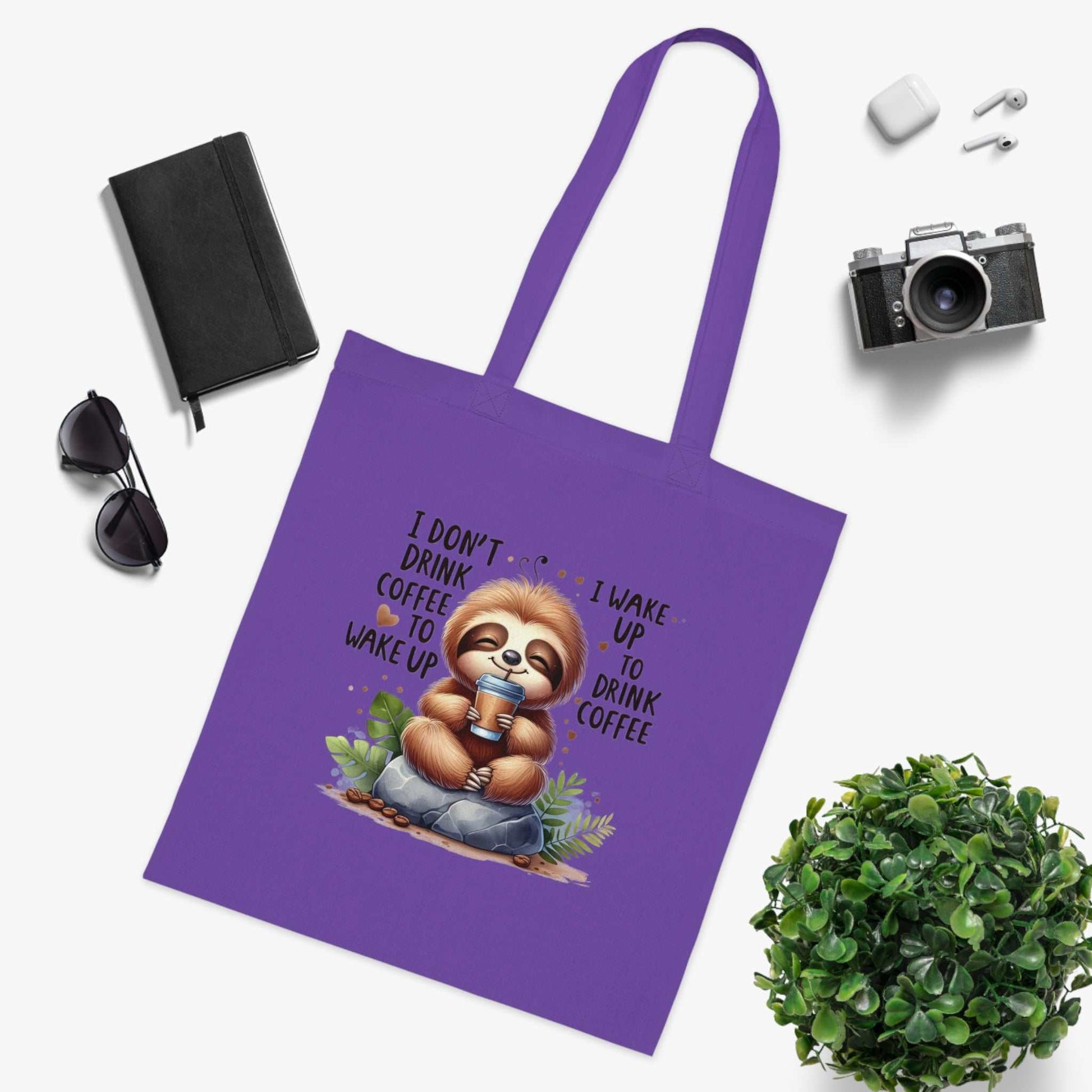 Cotton sloth tote bag with colorful design, 100% cotton, perfect for stylish carrying and gifting.