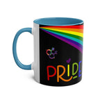 LGBTQ+ Pride mug with rainbow design and blue handle.