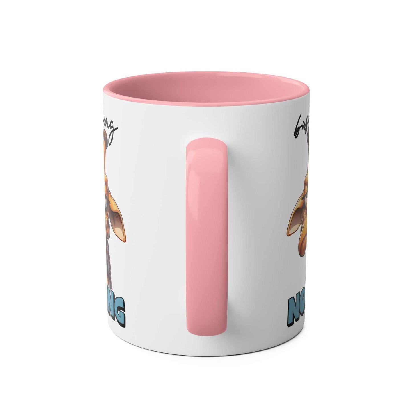 Giraffe coffee mug with pink handle, busy doing nothing design, 11oz ceramic, microwave and dishwasher safe.