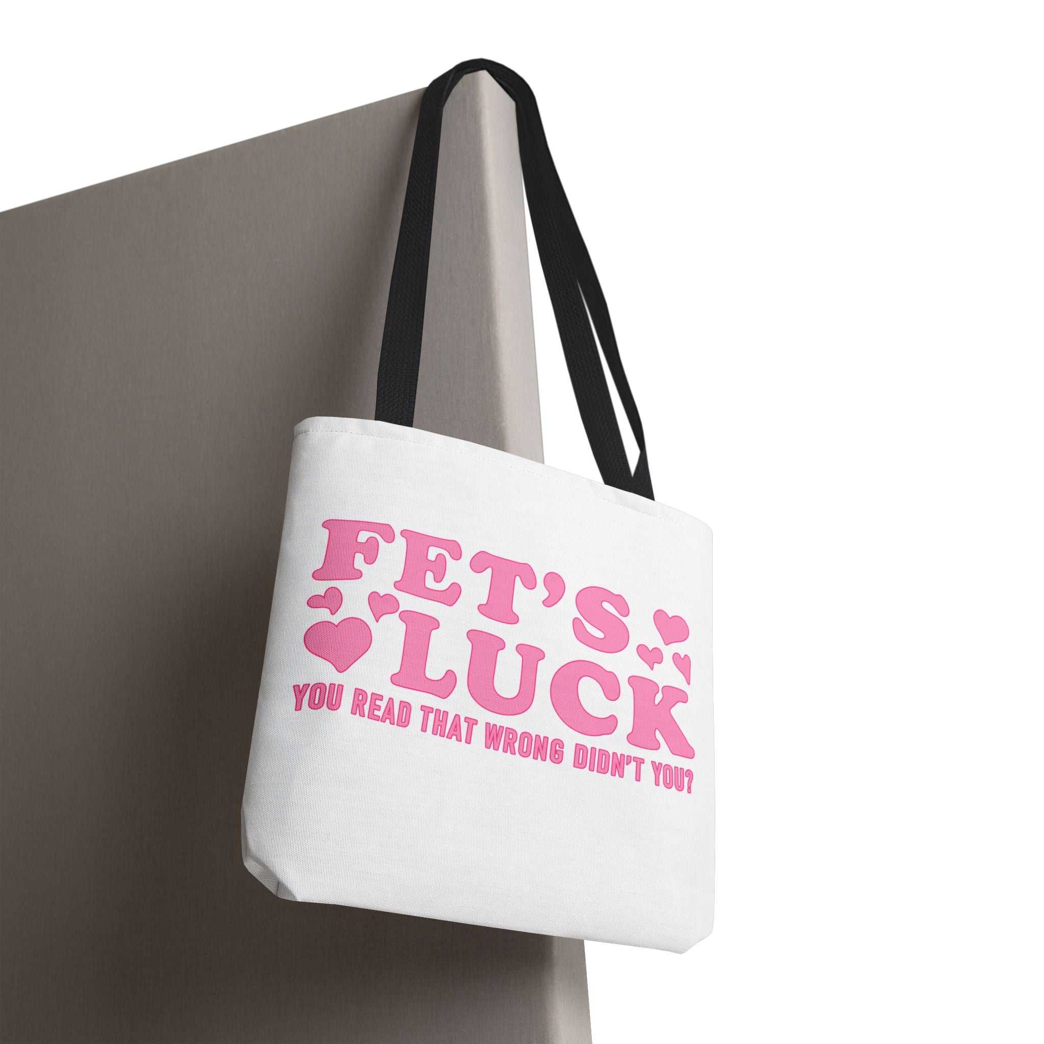 Pink heart tote bag with cheeky fun design and multiple handle color options