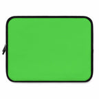 Lime green neoprene laptop sleeve with soft foam lining and dual zipper closure, lightweight and waterproof protective case for laptops.