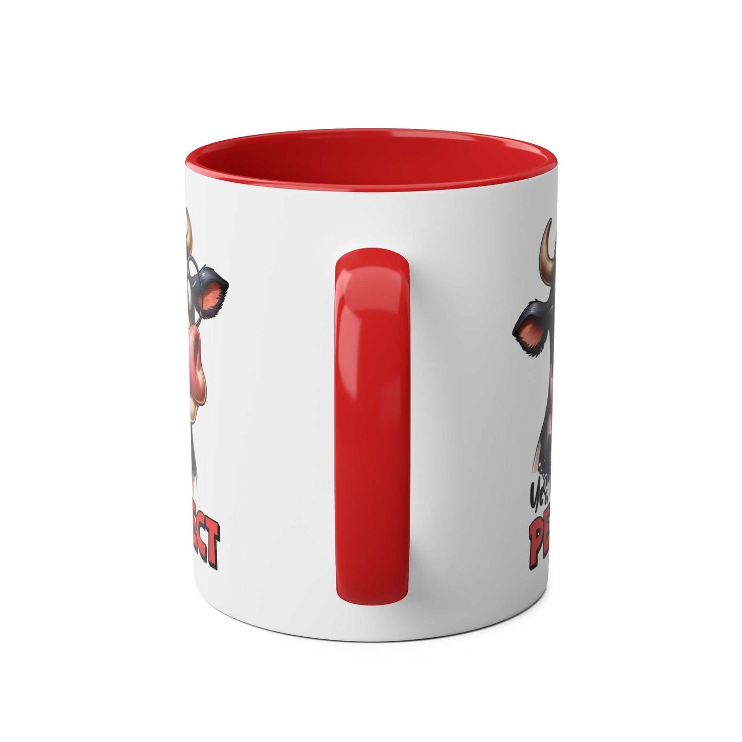 I Am Perfect Coffee Mug with cow design, red handle and interior.