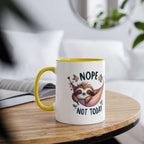 Cute sloth coffee mug with a whimsical design, perfect for animal lovers.
