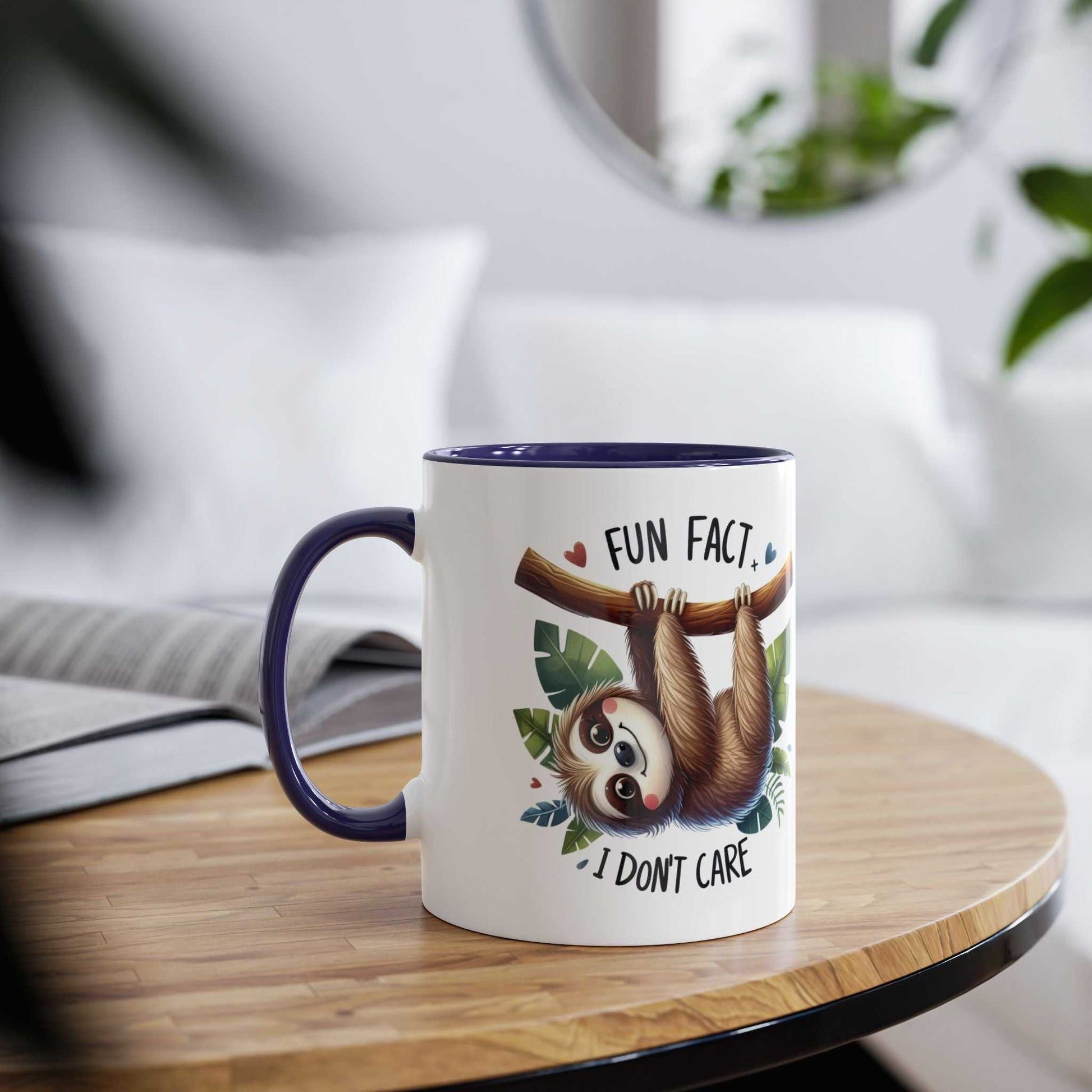 Cute sloth coffee mug with whimsical design on wooden table.