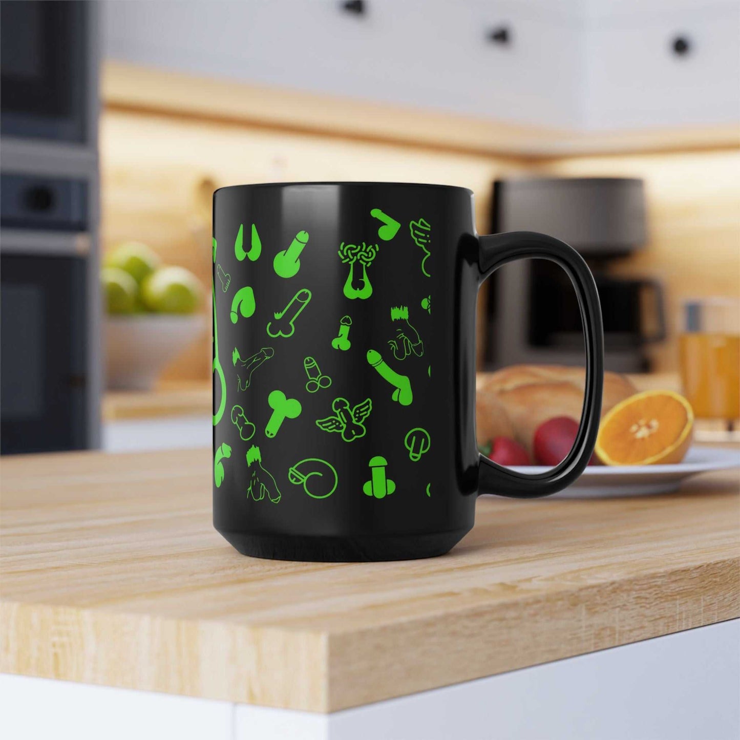 Black ceramic mug with playful green willies print, glossy finish, dishwasher and microwave safe, available in 11oz and 15oz sizes.