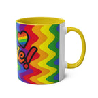 LGBTQ+ Pride mug with vibrant rainbow design and heart, glossy finish, 11oz ceramic.