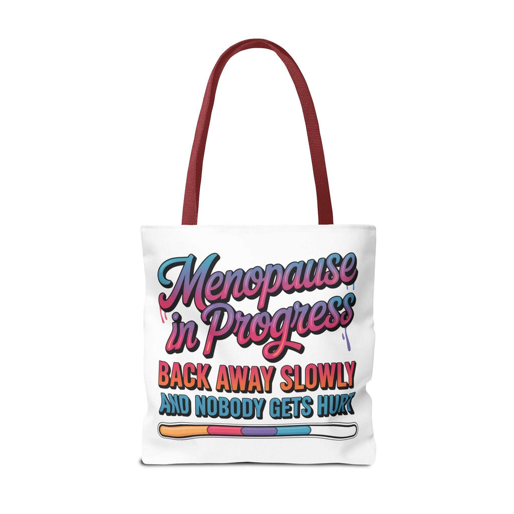 Menopause in Progress tote bag with cheeky design, durable polyester, multiple sizes and handle colors, lightweight and reusable