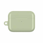 Sage green hard shell AirPods protective case with glossy finish and lightweight design
