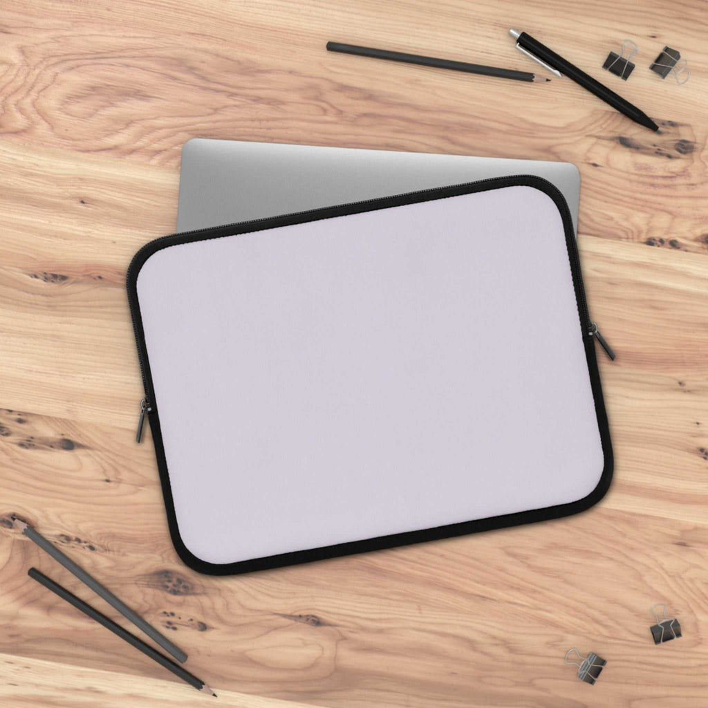 Lavender laptop sleeve made of durable neoprene with soft foam lining, dual zipper, lightweight, waterproof, fits most laptops, stylish protective case.