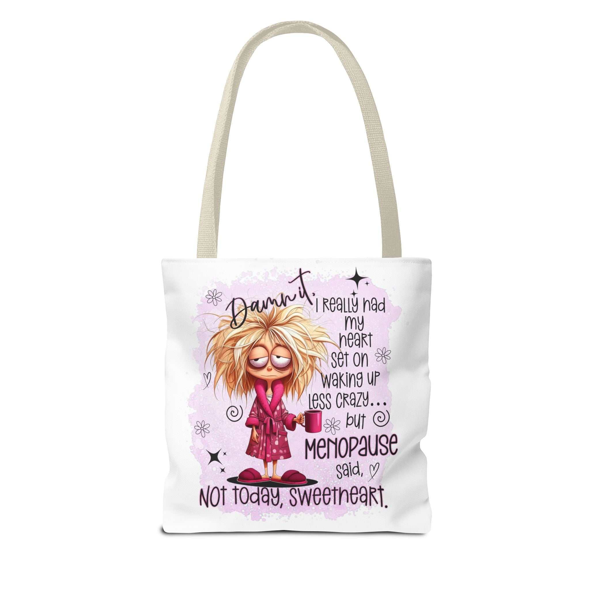 Cheeky menopause humour tote bag with bold design, durable spun polyester, available in three sizes and multiple handle colors for everyday fun and practicality