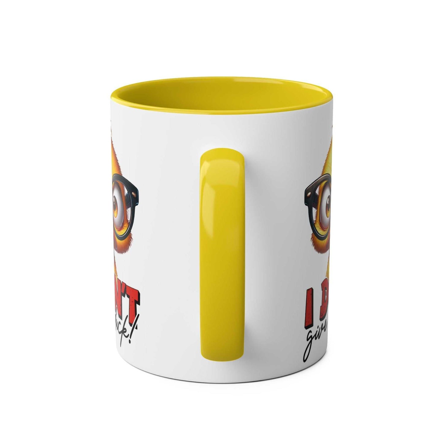 Playful duck design on the "I Dont Give A Duck" coffee mug with yellow handle and interior.